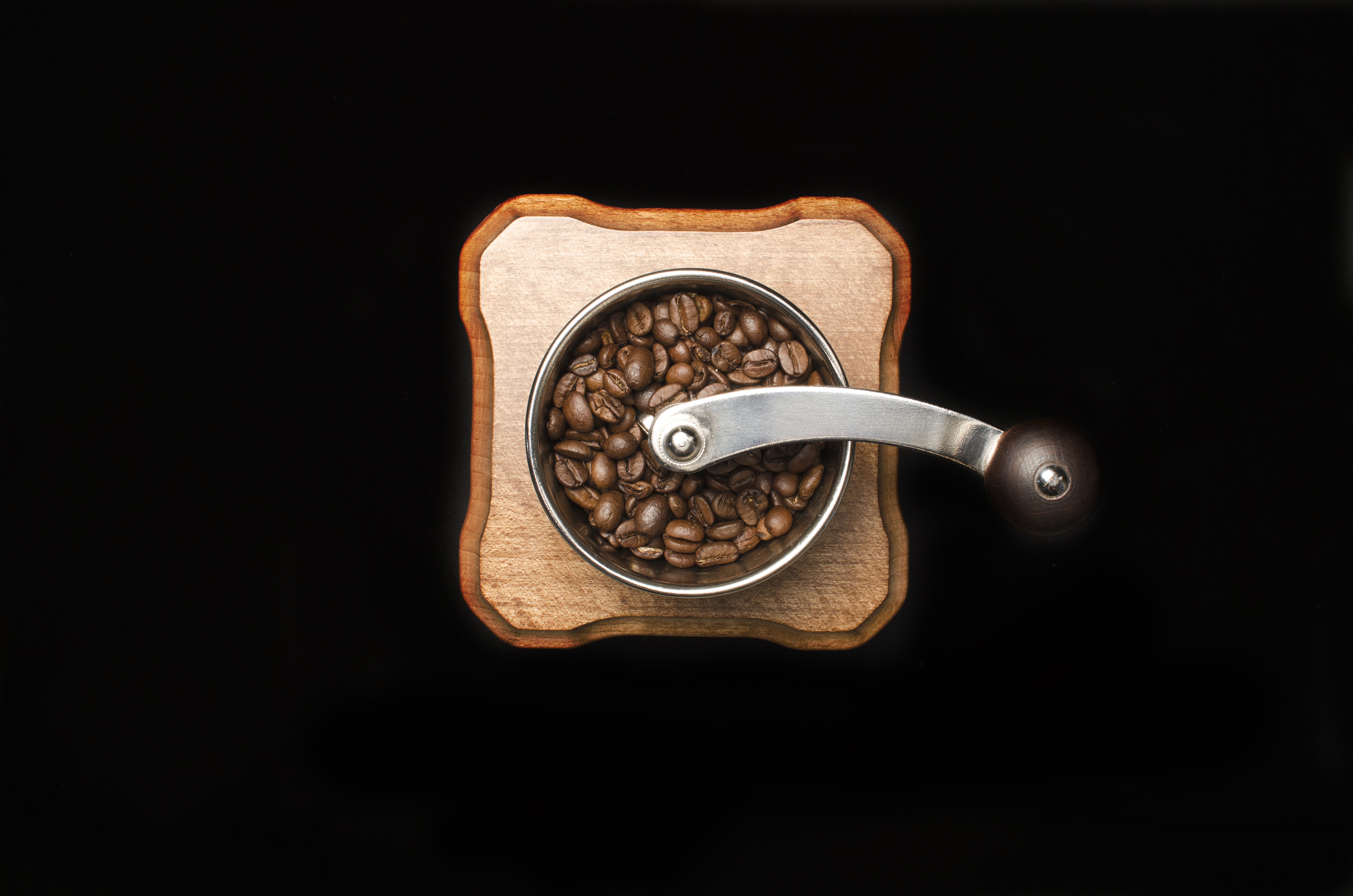 Coffee Mill Isolated On Black Background
